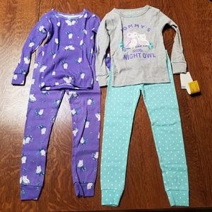 Two pair of carters toddler pjs